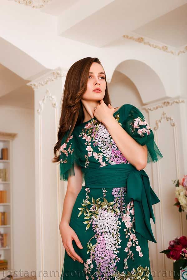 Embroidery on a green dress - computer embroidery